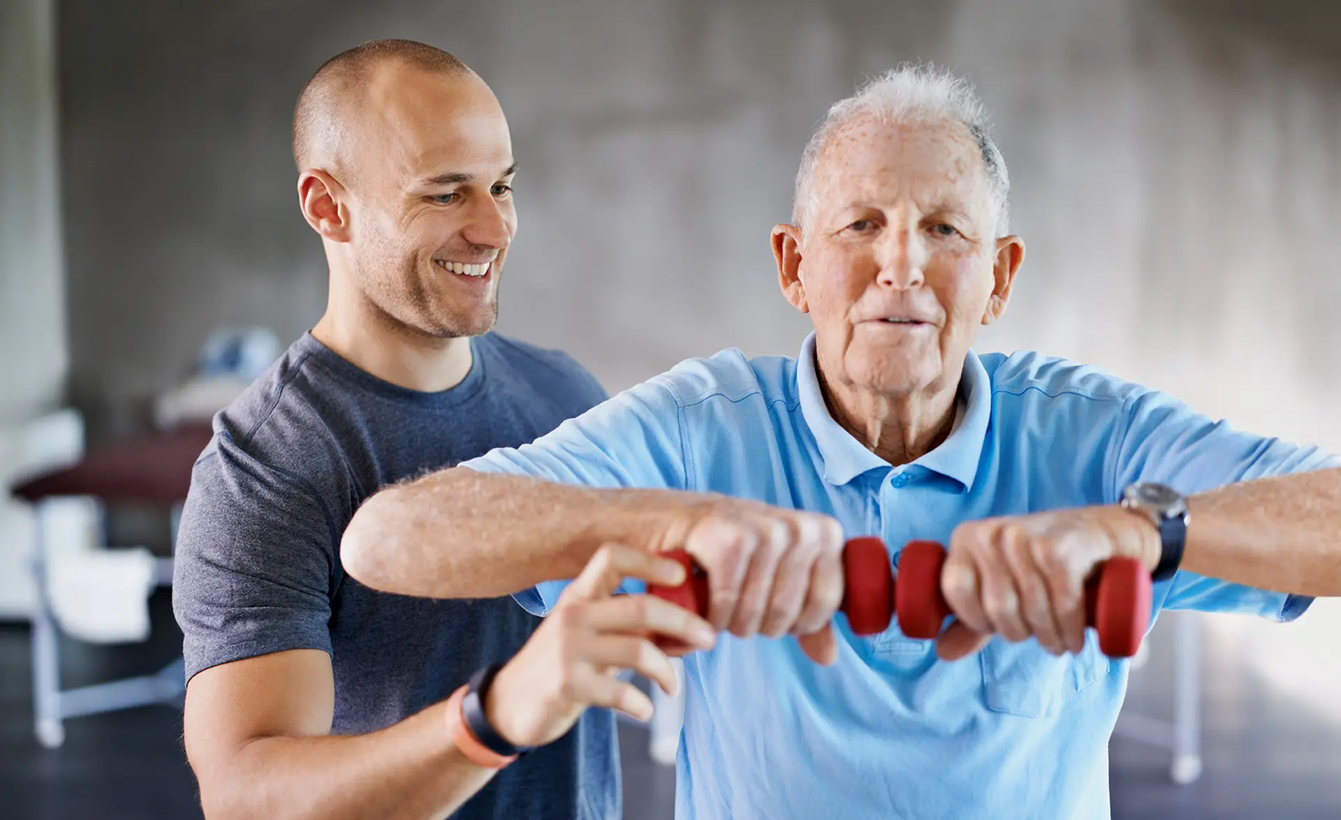 Physical therapist helping patient